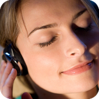 image of woman listening to headphones. 